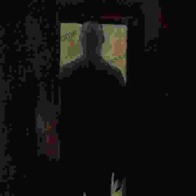 A Shadowy Figure Stands In The Doorway Of An Old Hotel, Its Eyes Glowing Menacingly. Ghosts And Legends Of Michigan S West Coast (Haunted America)