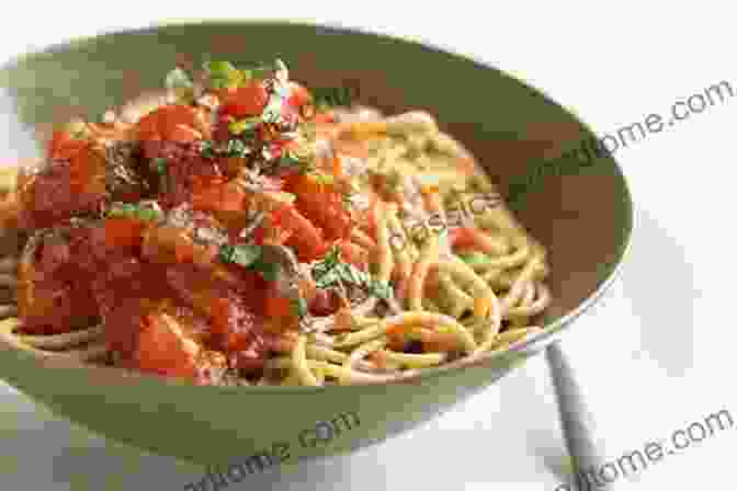 A Steaming Bowl Of Spaghetti With Fresh Tomato Sauce, A Popular School Lunch Dish In Italy What S For Lunch?: How Schoolchildren Eat Around The World