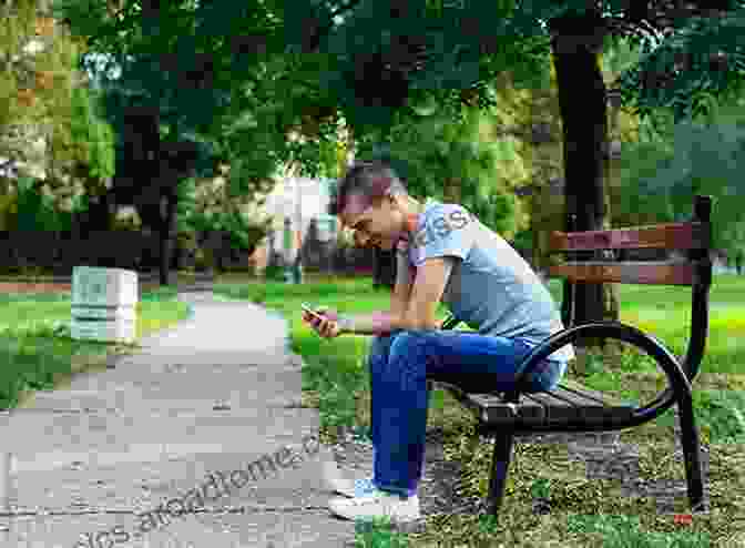 A Young Person Sitting On A Bench, Looking Thoughtful. Adolescence And Psychoanalysis: The Story And The History